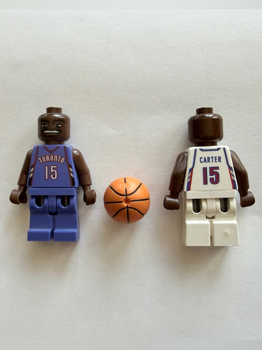 LEGO NBA #15 Vince Carter Minifigure
Toronto Home and Away Uniform with Ball.